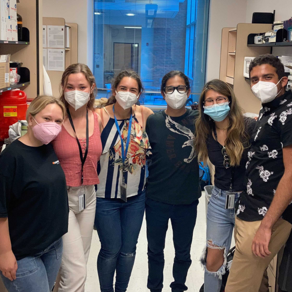 Caleigh Lynch at her summer internship posing with colleagues