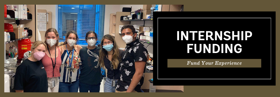 interns with masks in a lab