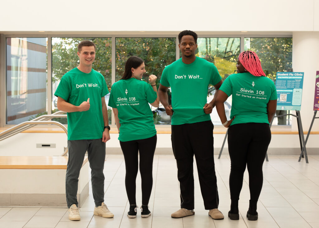 students wearing don't wait slavin 108 t-shirts