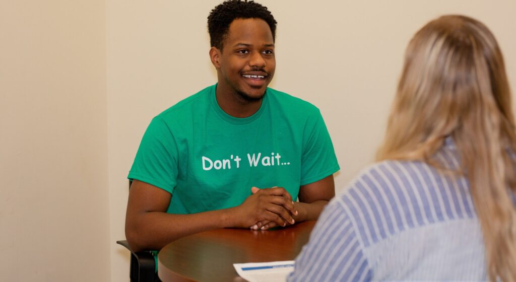 student talking to a career coach