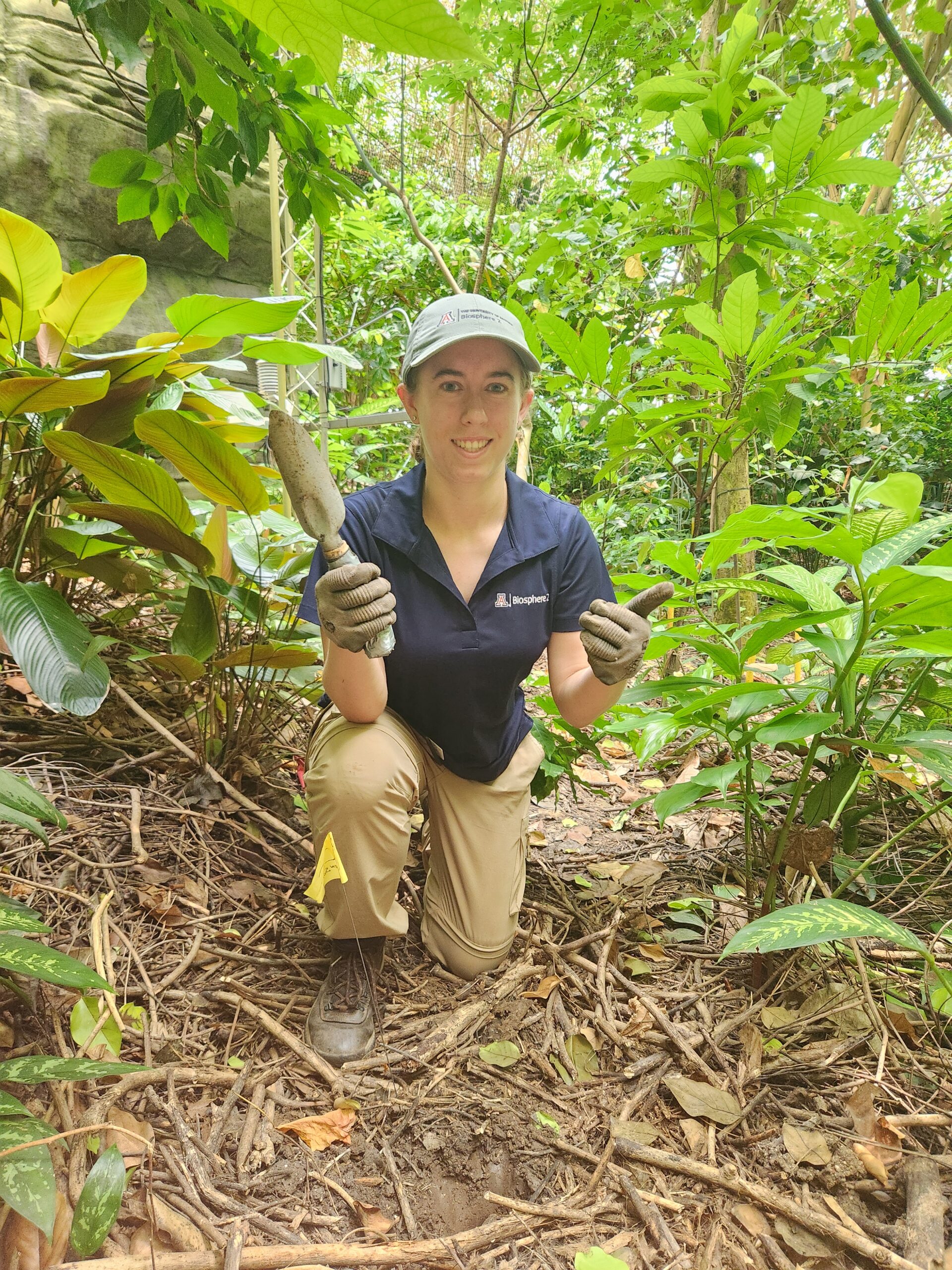 student outside in woods during her intermnship